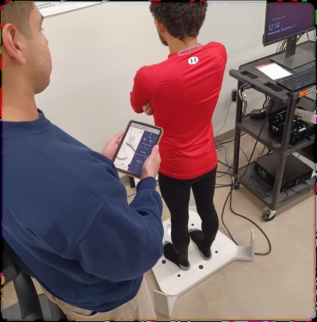 A study participant being scanned on the Volumental 3D foot scanner at Texas A&M University-San Antonio